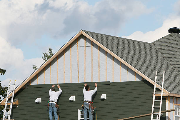 Professional Siding Replacement technician working in Junction City, OH